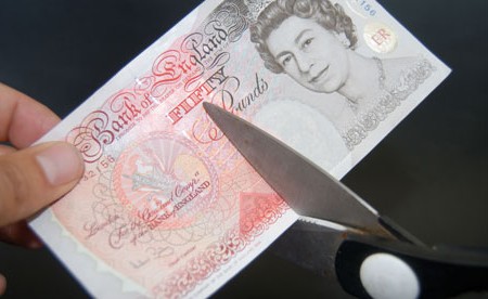 £50 note cut with scissors